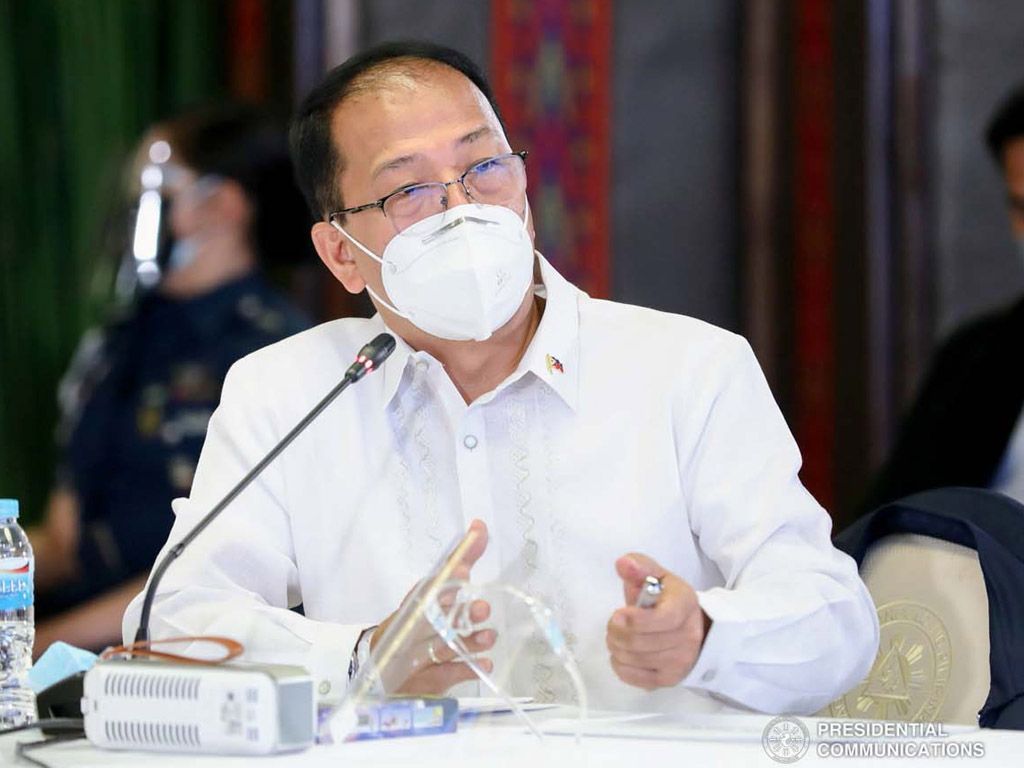 Presidential Adviser on Peace Process and National Task Force against Coronavirus Disease-2019 (NTF COVID-19) chief implementer, Secretary Carlito Galvez Jr. gives an update to President Rodrigo Roa Duterte during a meeting with the Inter-Agency Task Force on the Emerging Infectious Diseases (IATF-EID) core members at the Malacañang Palace on December 13, 2021. RICHARD MADELO/ PRESIDENTIAL PHOTO
