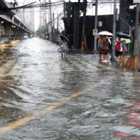 One of the flooded streets in Manila during monsoon rains on Monday. 
Photo courtesy: Manila DRRM Office